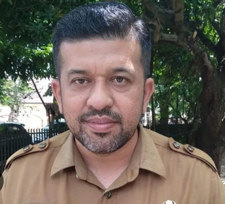 Plt. Kepala Dinas Perindustrian, Perdagangan, Koperasi dan Usaha Mikro, Kecil dan Menengah (Disperindagkop dan UKM) Kota Langsa, Harris Gusnally SE MH, foto/ist.